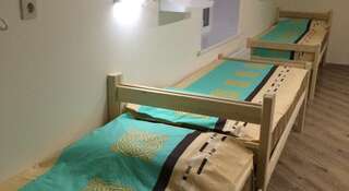Гостиница Хостел Друзья Краснодар Односпальная кровать в общем номере для мужчин и женщин-3